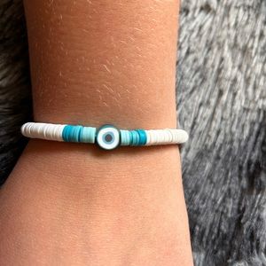 New White to Teal Ombré Pattern Evil Eye Clay Bead Artisan Bracelet